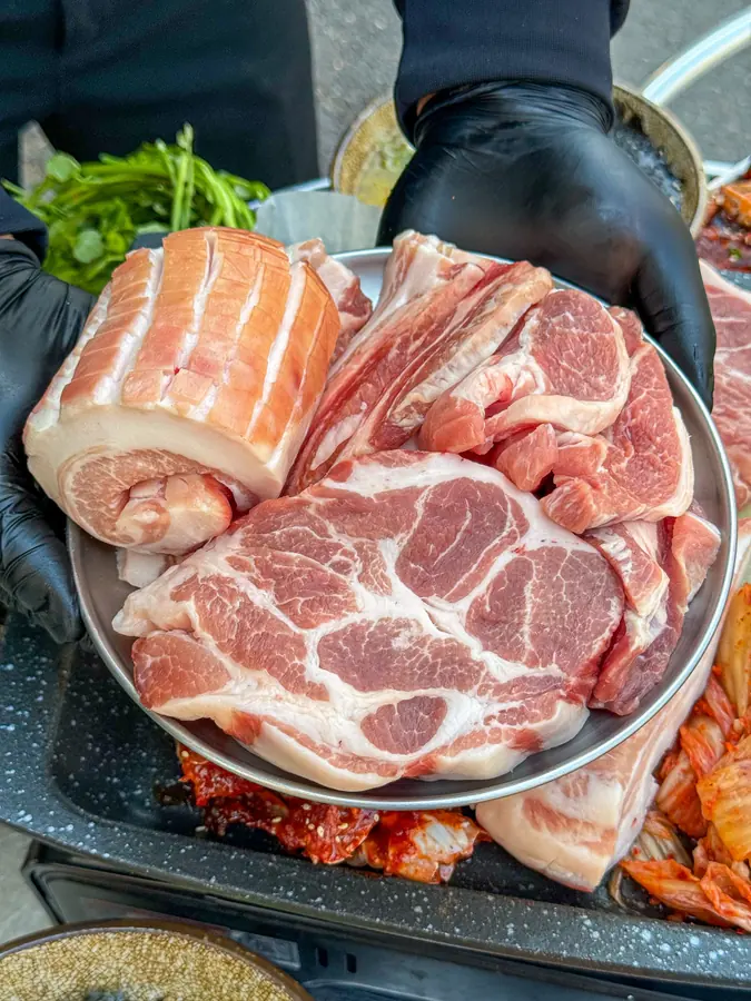 Kim Sukseong Special 1 (800g) — Thick-cut 2cm pork neck for two, plus limited-edition aged pork and aged special cuts. Everything we're proud of, all on one grill.